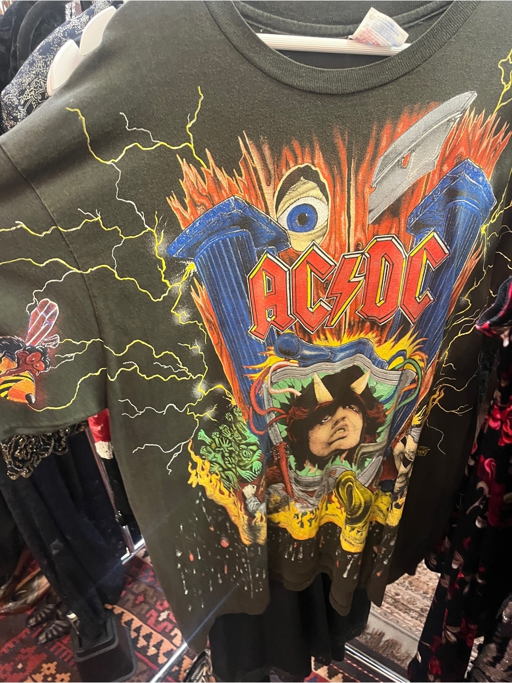 AC/DC Black Tee with Red & Yellow Logo and Multicolor Rock Graphic